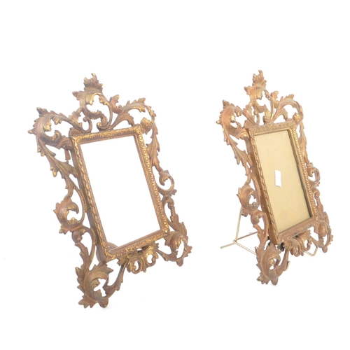 276 - A pair of 19th Century brass gilded rococo style picture frames of rectangular form having ornate ac... 