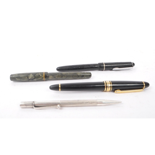 283 - A collection of four vintage 20th Century pens to include three fountain pens to include Burnham B48... 