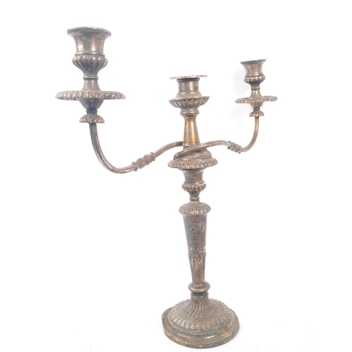 288 - An early 20th Century large silver plated twisted twin arm candelabra having scalloped edge detailin... 