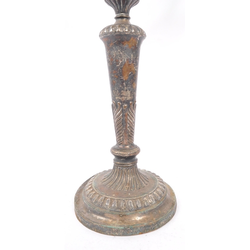 288 - An early 20th Century large silver plated twisted twin arm candelabra having scalloped edge detailin... 