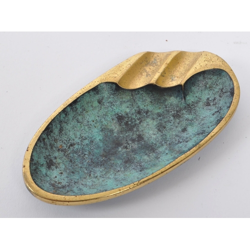 297 - Franz Hagenauer - A 1950s mid Century brass ashtray of elliptical form attributed to Austrian design... 