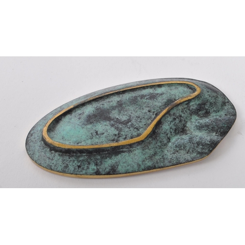 297 - Franz Hagenauer - A 1950s mid Century brass ashtray of elliptical form attributed to Austrian design... 