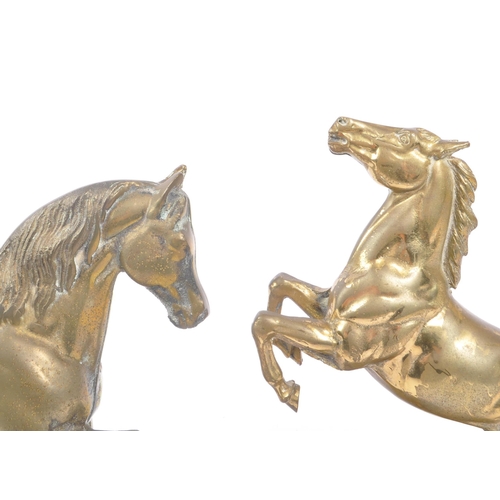 301 - Two 20th century gilt bronze and brass horse figures to include one rearing on hind legs and the oth... 