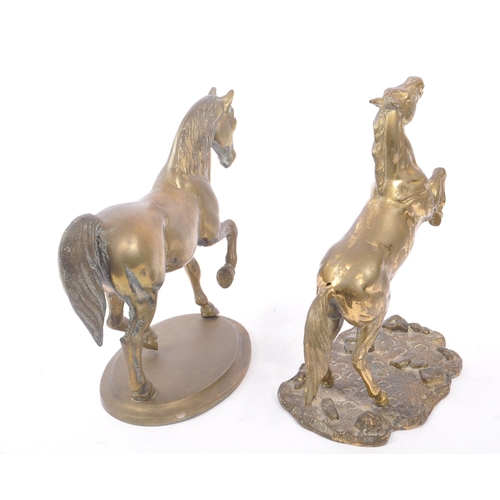 301 - Two 20th century gilt bronze and brass horse figures to include one rearing on hind legs and the oth... 