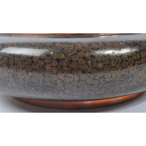 309 - An early 20th century late Qing dynasty Chinese copper cloisonne bowl / dish. The dish of rounded fo... 