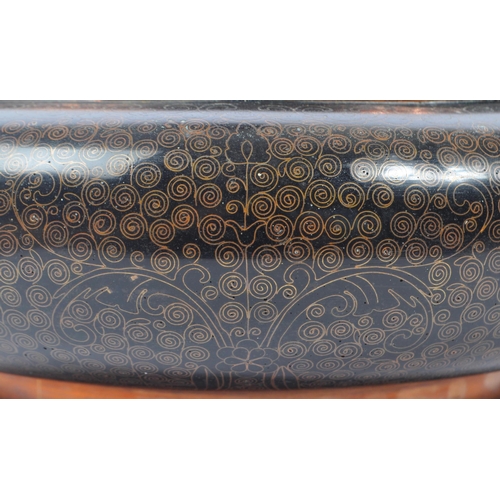 309 - An early 20th century late Qing dynasty Chinese copper cloisonne bowl / dish. The dish of rounded fo... 