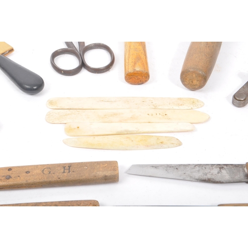 310 - A collection of mid Century and later vintage leather making tools to include scissors, leather cutt... 