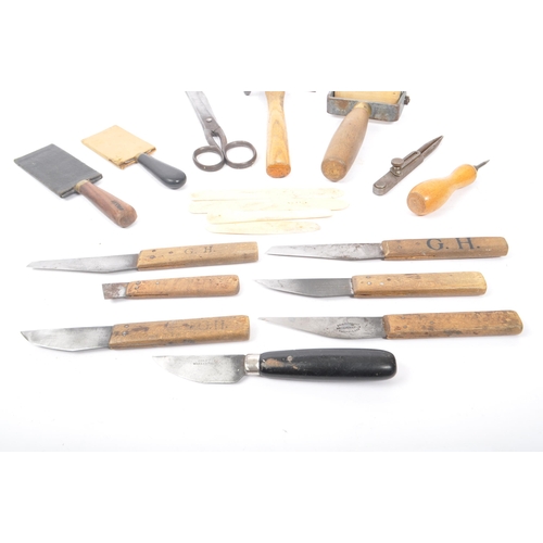 310 - A collection of mid Century and later vintage leather making tools to include scissors, leather cutt... 