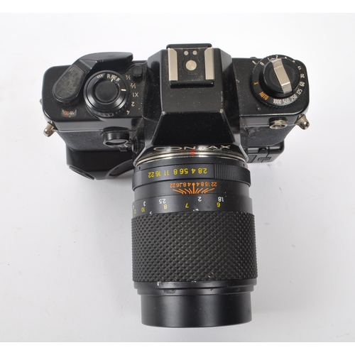 311 - Contax - A late 20th century Contax 139q (139 Quartz) 35mm camera and auto winder. The lot to includ... 