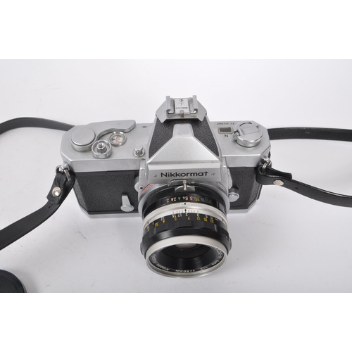 315 - Nikon - A mid 20th century Nikon Nikkormat ( Nikomat ) FT 35mm SLR camera. The camera having a silve... 