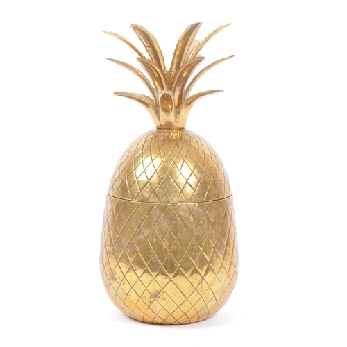 316 - A vintage mid 20th century circa 1960s brass pineapple ice bucket decoration. The pineapple having c... 