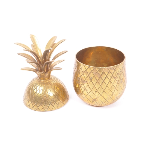 316 - A vintage mid 20th century circa 1960s brass pineapple ice bucket decoration. The pineapple having c... 