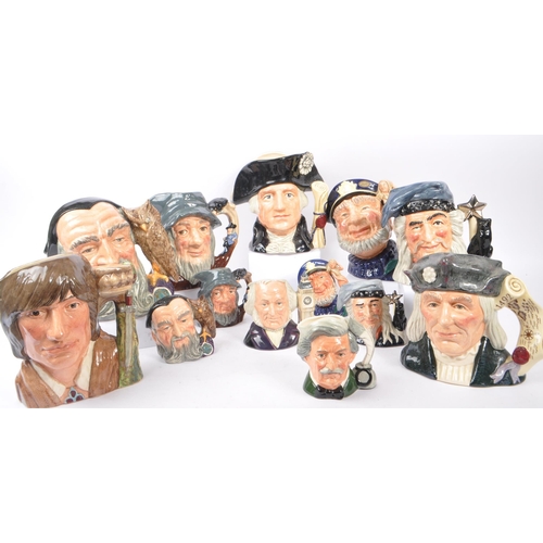 33 - Royal Doulton - A collection of 20th Century ceramic character jugs to include large jugs depicting ... 