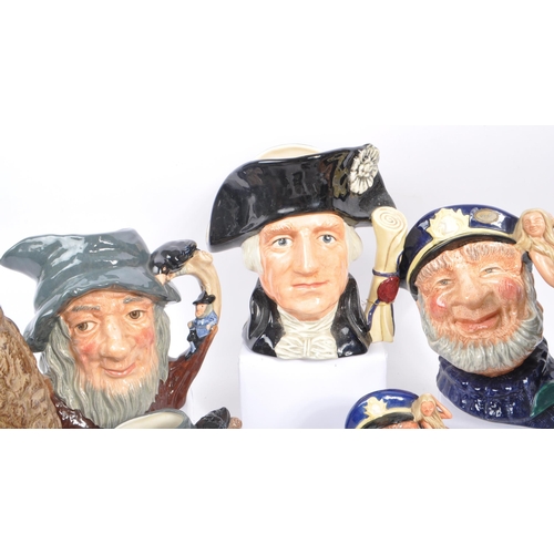 33 - Royal Doulton - A collection of 20th Century ceramic character jugs to include large jugs depicting ... 