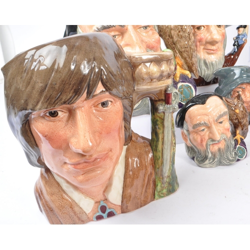 33 - Royal Doulton - A collection of 20th Century ceramic character jugs to include large jugs depicting ... 