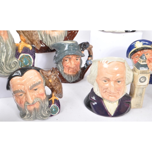 33 - Royal Doulton - A collection of 20th Century ceramic character jugs to include large jugs depicting ... 