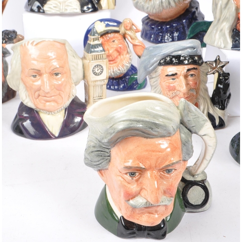 33 - Royal Doulton - A collection of 20th Century ceramic character jugs to include large jugs depicting ... 