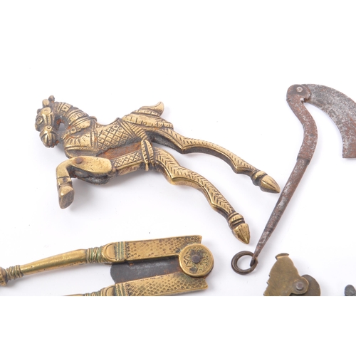 330 - A collection of 19th century & early 20th century Indian brass & bronze betel areca nut crackers. To... 