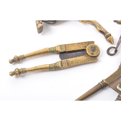 330 - A collection of 19th century & early 20th century Indian brass & bronze betel areca nut crackers. To... 