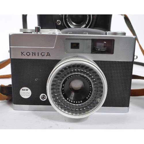 331 - A collection of mid 20th century Japanese 35mm rangefinder / viewfinder cameras. The collection to i... 