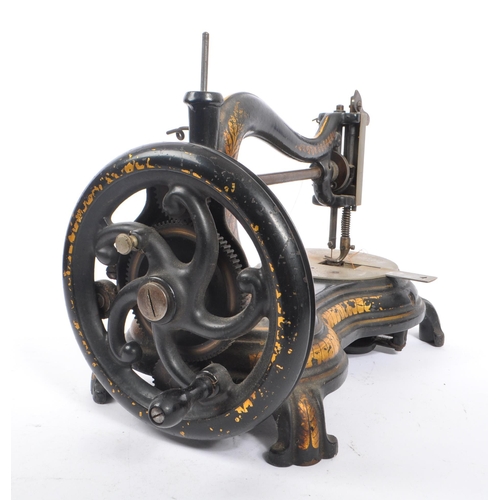 338 - Jones - A 19th century swan neck sewing machine by Jones & Co. The machine having ebonised body with... 