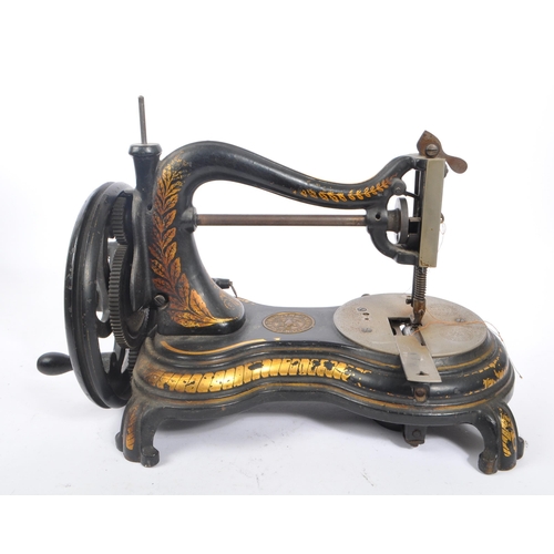 338 - Jones - A 19th century swan neck sewing machine by Jones & Co. The machine having ebonised body with... 