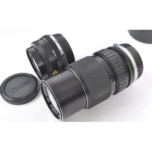 339 - Olympus - A collection of mid 20th century Olympus O/OM mount lenses and accessories. The collection... 