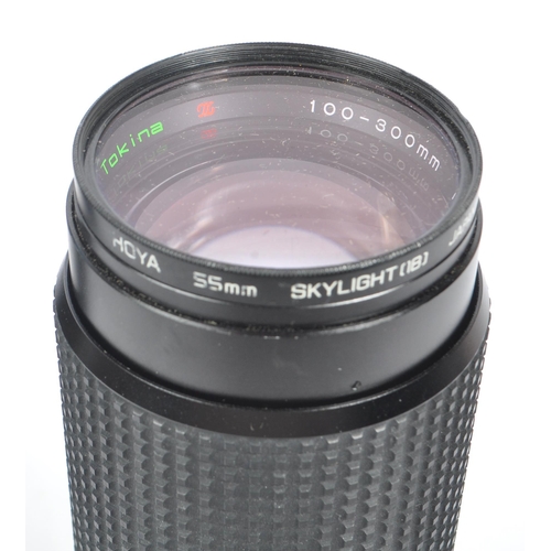 339 - Olympus - A collection of mid 20th century Olympus O/OM mount lenses and accessories. The collection... 