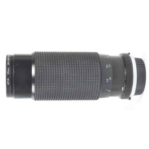 339 - Olympus - A collection of mid 20th century Olympus O/OM mount lenses and accessories. The collection... 