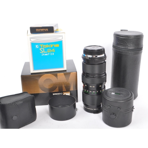 339 - Olympus - A collection of mid 20th century Olympus O/OM mount lenses and accessories. The collection... 