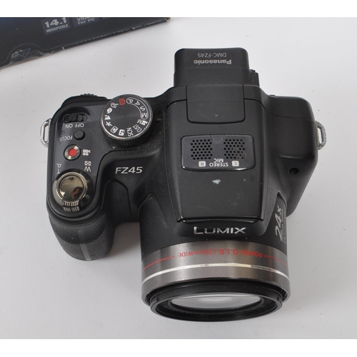 341 - Panasonic - A Panasonic digital bridge camera and compact digital camera. The collection to include ... 