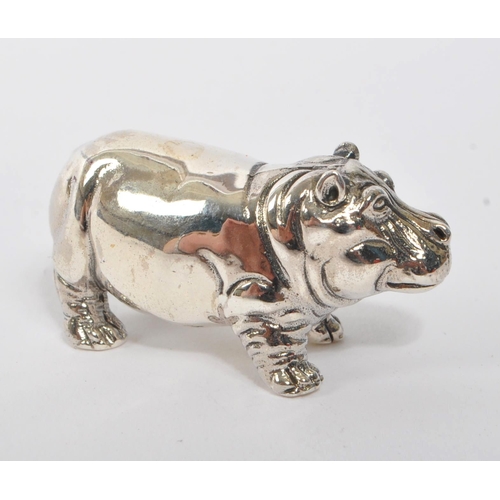 352 - A small 20th Century vintage well cast silver figure in the form of a hippopotamus. Measuring approx... 