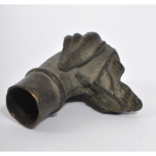 363 - A 20th Century vintage bronze walking cane handle in the form of a dog's head. Measuring approximate... 