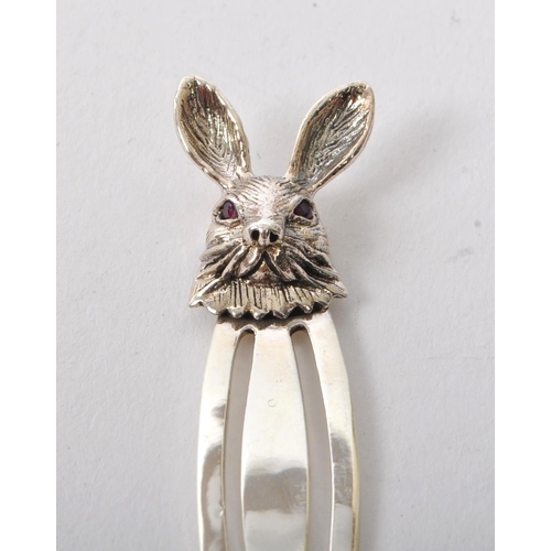 364 - A 20th Century vintage sterling silver bookmark having head of hare finial top with red stone eyes. ... 