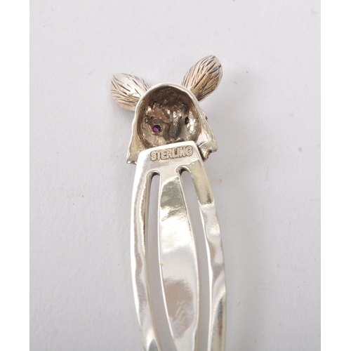 364 - A 20th Century vintage sterling silver bookmark having head of hare finial top with red stone eyes. ... 