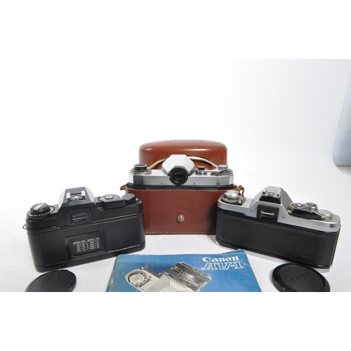 367 - Photographic Interest - A collection of three mid 20th century 35mm SLR cameras. The collection to i... 