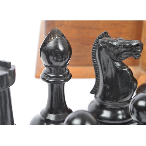 370 - F H Ayres - An early 20th century, The Staunton Chessmen pattern, 32 weighted pieces chess set. With... 