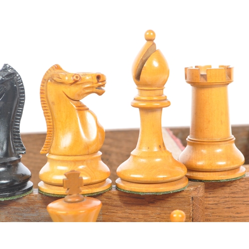 370 - F H Ayres - An early 20th century, The Staunton Chessmen pattern, 32 weighted pieces chess set. With... 