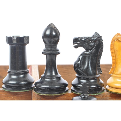 370 - F H Ayres - An early 20th century, The Staunton Chessmen pattern, 32 weighted pieces chess set. With... 