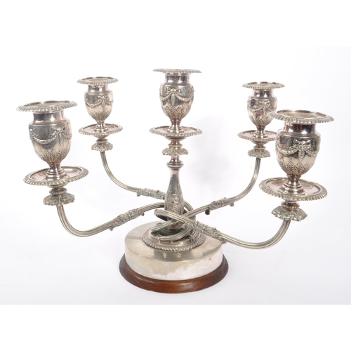 371 - Early 20th century silver plated French continental four armed candelabra. With swagger banner decor... 