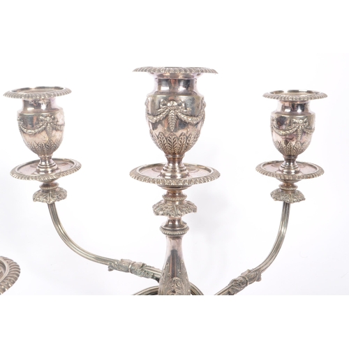 371 - Early 20th century silver plated French continental four armed candelabra. With swagger banner decor... 