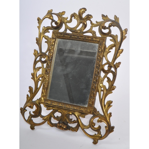 375 - A vintage early 20th century continental rococo baroque style table mirror. With ornate pierced flor... 