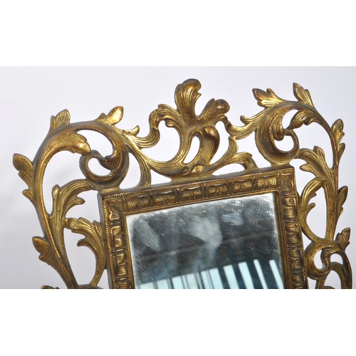 375 - A vintage early 20th century continental rococo baroque style table mirror. With ornate pierced flor... 