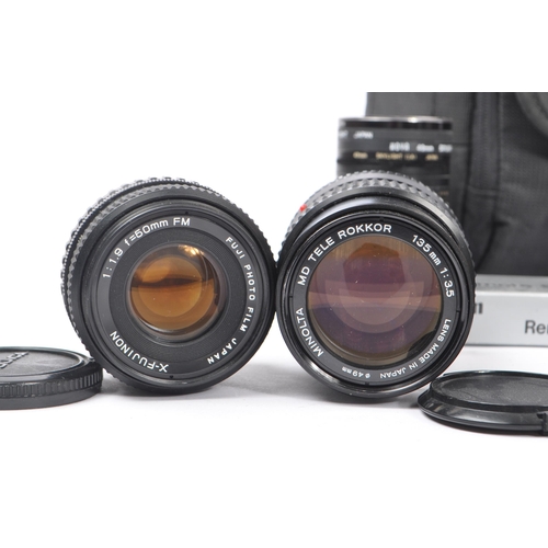 382 - Photographic Interest - A large collection of 20th century photographic camera lenses and accessorie... 