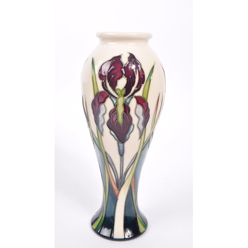 388 - Moorcroft - A china Moorcroft Pottery vase in the ' Antheia ' pattern designed by Nicola Slaney havi... 