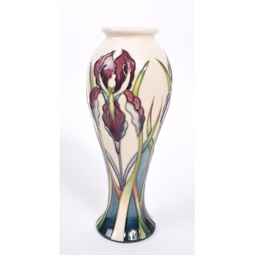 388 - Moorcroft - A china Moorcroft Pottery vase in the ' Antheia ' pattern designed by Nicola Slaney havi... 