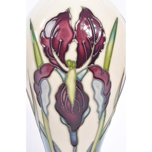 388 - Moorcroft - A china Moorcroft Pottery vase in the ' Antheia ' pattern designed by Nicola Slaney havi... 