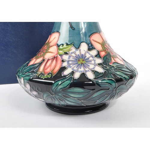 389 - Moorcroft - A china Moorcroft vase in the ' Carousel ' pattern by Rachel Bishop, her signature and n... 