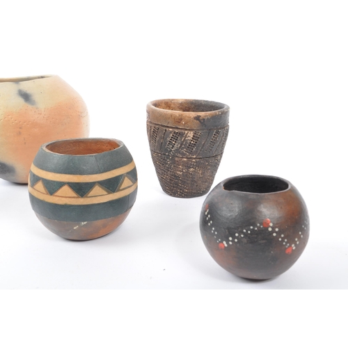 39 - A collection of vintage 20th century East African / Kenyan clay ceramic pottery pots. With textured ... 