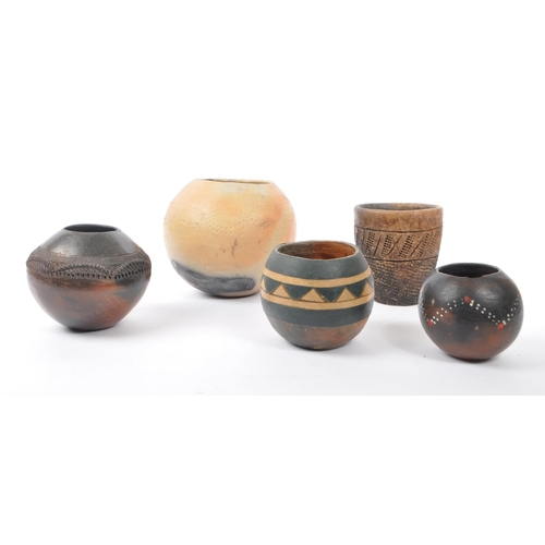 39 - A collection of vintage 20th century East African / Kenyan clay ceramic pottery pots. With textured ... 